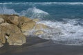 Ocean meets beach rock along the South Florida coastline Royalty Free Stock Photo