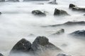 Ocean Mist Seascape of Water Rushing through Rocks Royalty Free Stock Photo