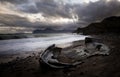 Ocean, old broken boat on shore Royalty Free Stock Photo