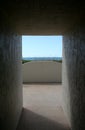 Ocean through open doorway Royalty Free Stock Photo