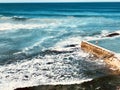 Ocean pool with crushing waves