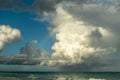 Ocean rainbow with stunning cloudscape