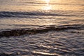 Ocean ripples at the sunset Royalty Free Stock Photo