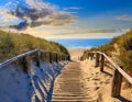 ocean sandy pathway fence wooden to ocean beach sea Royalty Free Stock Photo