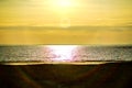 Ocean, sea sunset on the background of the sun going beyond the horizon.  beach and wonderful Royalty Free Stock Photo