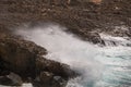 Ocean, sea waves hit the stone shore. The waves in the storm hit the rocks with great splashes Royalty Free Stock Photo