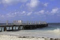 Ocean side dock on a tranquil sunny day.