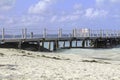 Ocean side dock on a tranquil sunny day.