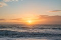 Ocean sunset blue orange rough seas waves dusk dawn