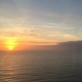 Ocean Sunset with a Horizon Line and Sun Reflection