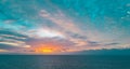 Ocean sunset on sky background with colorful clouds. Calm sea with sunrise sky, hawaii. Royalty Free Stock Photo