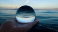 Ocean Surface Ripples Captured in Glass Ball Royalty Free Stock Photo