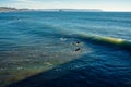 Ocean surfing. Cayucos beach on California`s central coast is one of the best beaches in California for surfing and swimming