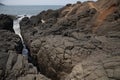 Ocean tides hitting the rocky beach Royalty Free Stock Photo