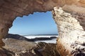 Ocean view from a arch window of limestone