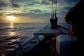 The ocean view from the bow of a sailing ship on the beautiful sunsets Royalty Free Stock Photo