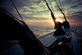 The ocean view from the bow of a sailing ship on the beautiful sunsets Royalty Free Stock Photo