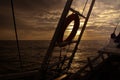 The ocean view from the bow of a sailing ship on the sunsets Royalty Free Stock Photo