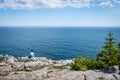 Taking in the Ocean View from a cliff in Acadia National Park