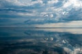 Ocean view and clouds reflection in the water in Gili Air Island Royalty Free Stock Photo