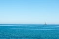 Ocean view with isolated sailboat on a sunny day Royalty Free Stock Photo