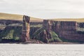 Ocean view of the Old Man of Hoy, a tall sandstone stack at the coast between Stromness and Scrabster at Orknay in Scotland