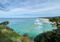 Ocean views and a surf beach taken from a rocky headland on a tropical island paradise off Queensland, Australia Royalty Free Stock Photo
