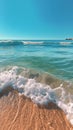 Ocean blue water wave beach with clouds, rocks and sand. Nature theme background Royalty Free Stock Photo