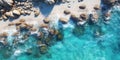 Blue ocean water beach from sky view, white sand and rock coral reef background Royalty Free Stock Photo