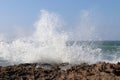 Ocean Water Beat Against Beach Rocks