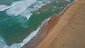 Ocean water foaming sandy seashore aerial view. Idyllic evening seascape beach Royalty Free Stock Photo