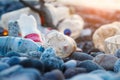 Ocean water pollution with plastic waste and water bottles