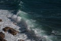 Ocean wave background breaking sea water rocky shore Royalty Free Stock Photo