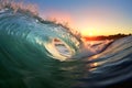 ocean wave close-up against sunset background