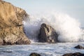 Ocean Wave Crashing Over Rocks on Coast Royalty Free Stock Photo