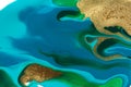 Ocean wave imitation abstract blue and green background. Gold powder