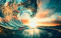 Sunset ocean surfing wave lip against sunlight
