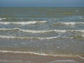 Ocean wave with white bubbles, Green sea water and Nautical landscape background. Seaside horizon view