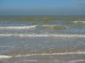 Ocean wave with white bubbles, Green sea water and Nautical landscape background. Seaside horizon view