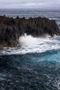 Ocean Waves break on Volcanic Cliffs, Azores