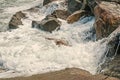 Ocean Waves breaking against rocky shoreline Royalty Free Stock Photo