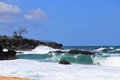 Ocean waves breaking along a rocky beach