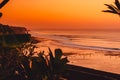 Ocean with waves and bright sunset or sunrise in Bali. Ocean with sunset Royalty Free Stock Photo