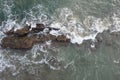 Ocean waves cover rock