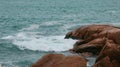 Ocean waves crashing on the rocky cliffs, Shek O Beach, Hong Kong Royalty Free Stock Photo