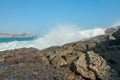 Ocean waves crashing on to lava rocks, Big Island of Lombok, Indonesia Royalty Free Stock Photo