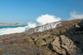 Ocean waves crashing on to lava rocks, Big Island of Lombok, Indonesia Royalty Free Stock Photo