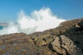 Ocean waves crashing on to lava rocks, Big Island of Lombok, Indonesia Royalty Free Stock Photo