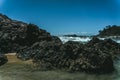 Ocean waves hitting the big rocks at the shore Royalty Free Stock Photo