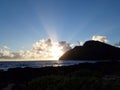 Ocean waves lap on Makapuu beach before dawn Royalty Free Stock Photo